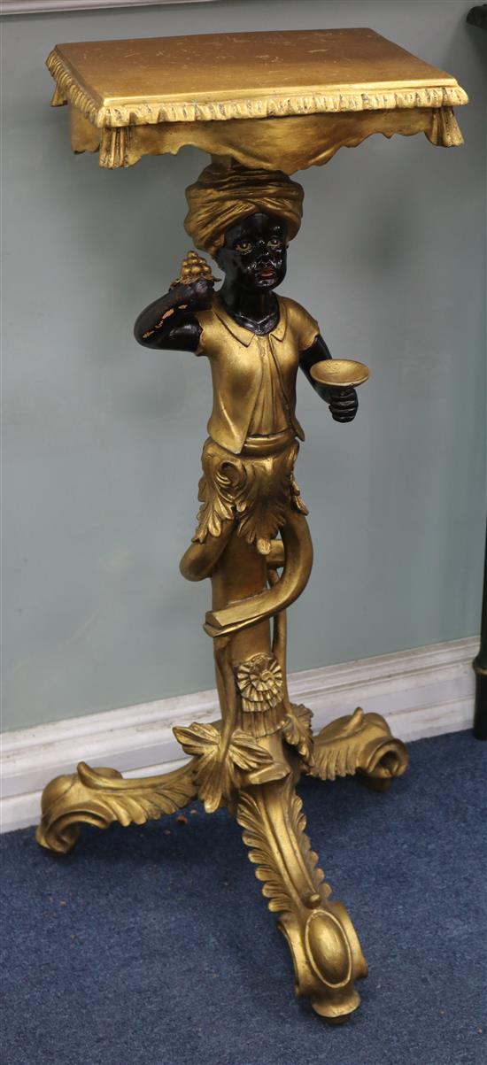 A pair of Blackamoor gilt stands base W.45cm